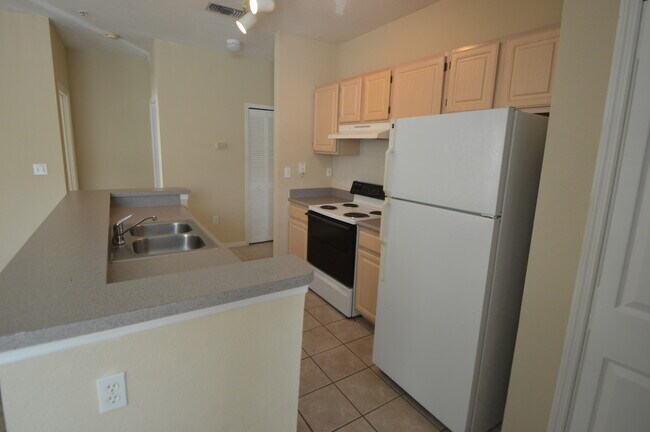 Building Photo - RIVERVIEW: Allegro Palms - Gated Community...