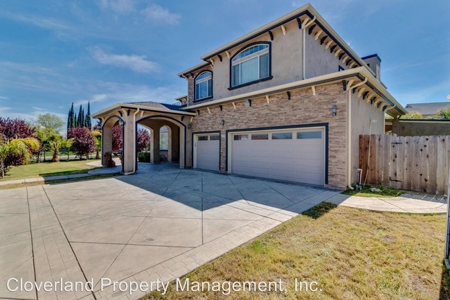 Building Photo - 5 br, 3.5 bath House - 5590 W. Grant Line Rd.