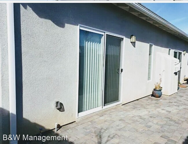 Building Photo - 4 br, 3 bath House - 1534 S. Loyola Ct.