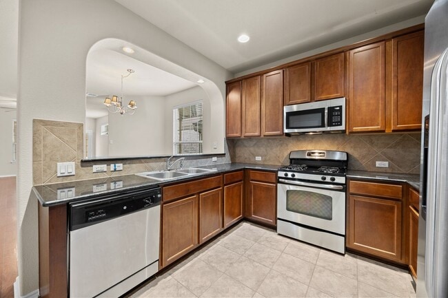 Building Photo - Updated Scofield Villas Condo with Garage & Private Yard