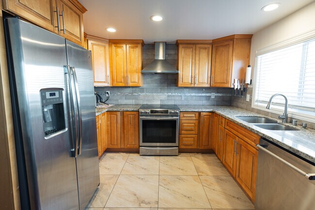 Wood cabinets & Granite Countertops - 1970 Tampa Way