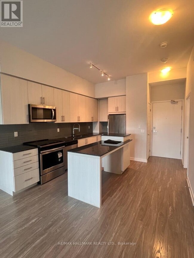 Photo du bâtiment - 4055-4055 Parkside Village Dr