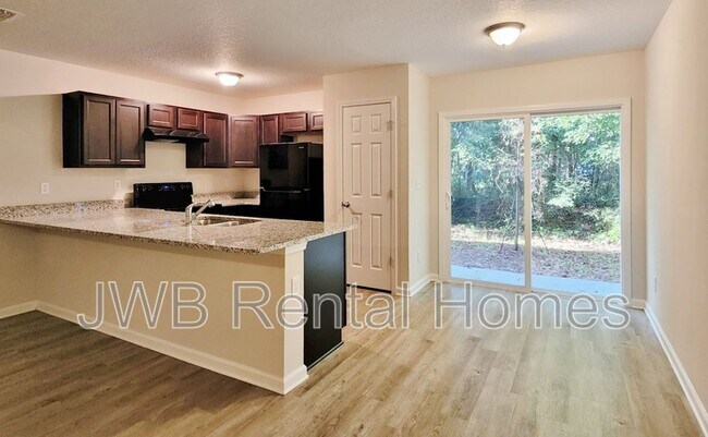 Foto del edificio - 7872 Playschool Ln