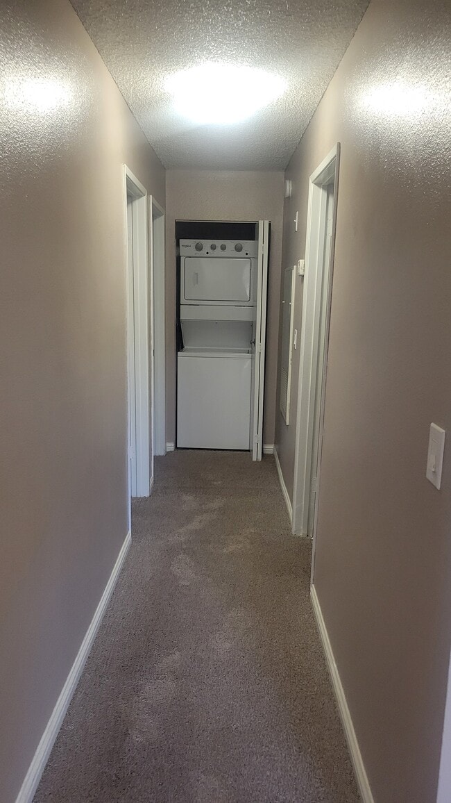 Hall/washer/dryer - Sunset Springs Apartments
