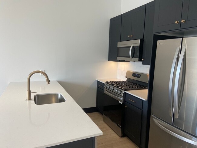 Building Photo - Stylish Studio Apartment | Watermark, Down...