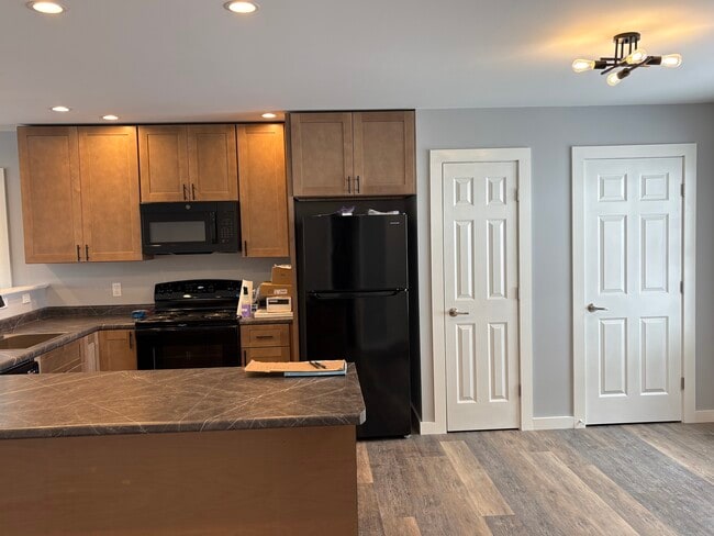 Kitchen with pantry and coat closet - 867 Upper Pleasant Valley Rd Apartments