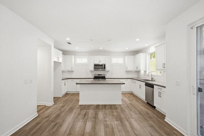 Building Photo - NEW LISTING 4 Bedroom, 3 Bathroom, 2 Garage Detached Condominium, with HVAC, Tankless Water Heate...