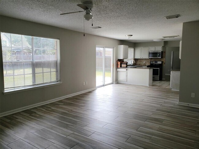 Building Photo - 4910 Cotter Lake Dr