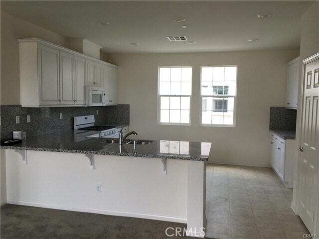 Foto del edificio - 6029 Rosewood Way