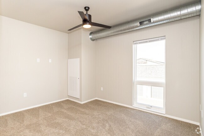 2BR, 2BA - 870SF - Primary Bedroom - Prairie Towers - Lavish Living