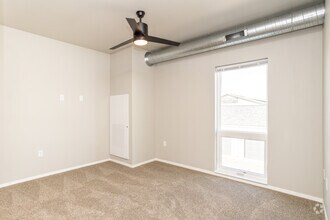 2BR, 2BA - 870SF - Primary Bedroom - Prairie Towers - Lavish Living