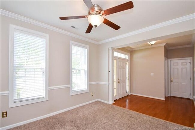 Building Photo - 4 BR/2.5BA  Community Pool | Fenced backyard!
