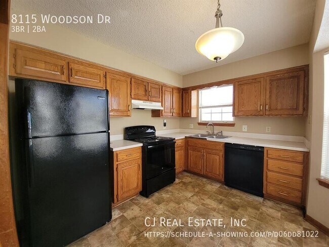 Foto del edificio - 8115 Woodson Dr