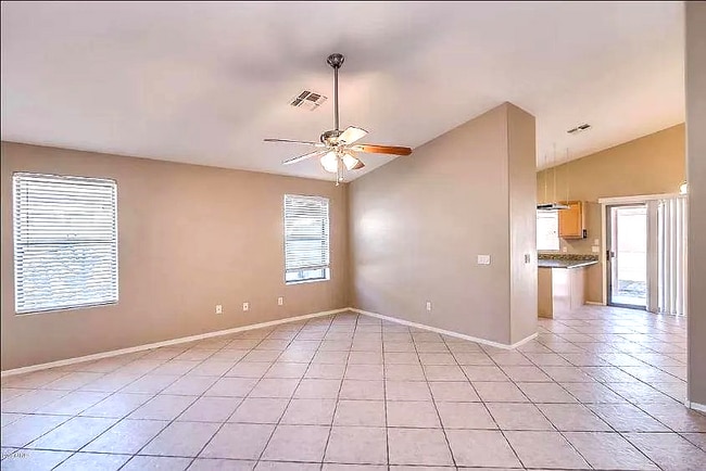 Formal dining with tile floor - 10608 E Caballero St