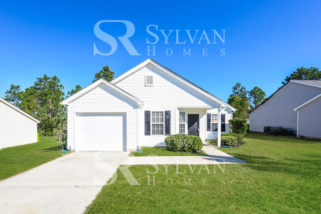 Building Photo - Welcome to this charming abode.