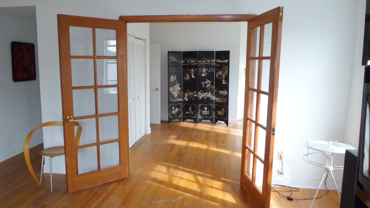 french doors to 2nd bedroom. no furniture - 1200 Euclid Ave