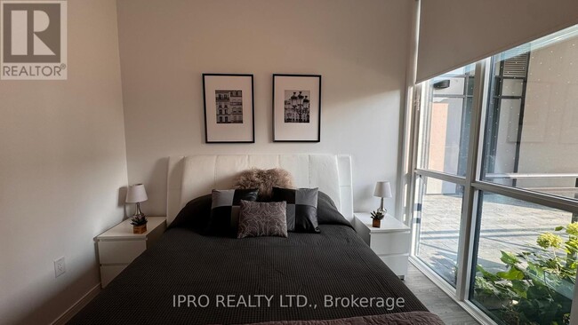 Bedroom with a view of greenery - 25 Neighbourhood Ln