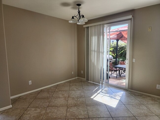 Building Photo - Two Story 3 Bedroom Townhome with 2 Car Garage in Gated Community