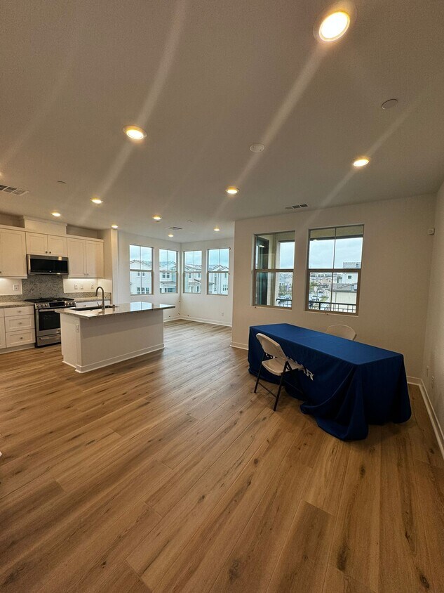 Kitchen and living room with nice views. Amenities listed in the description. - 1101 Lasso Way