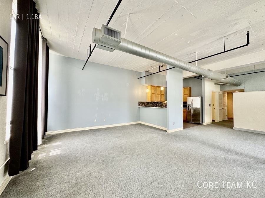 Primary Photo - 1 Bed + Den Condo + Garage Parking For Ren...