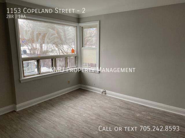 Building Photo - Two Bedroom Plus Den