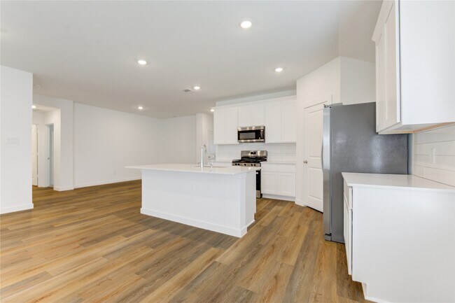 Building Photo - 9014 Rose Water Trl