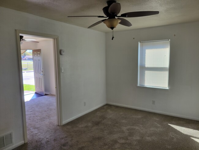 Bedroom toward livingroom - 1605 N W S Young Dr