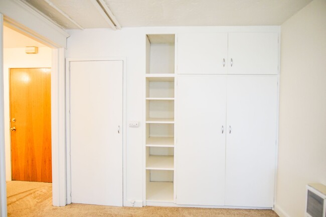 Building Photo - Close-in NE Daylight Basement Studio Ready...