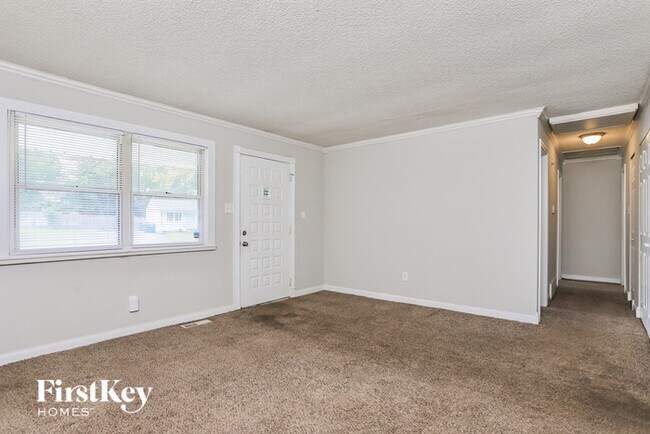 Foto del edificio - 4841 Rose Blossom Ln