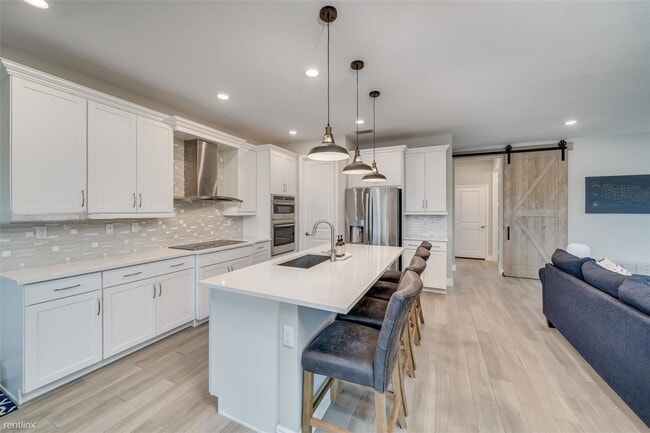 Foto del edificio - 5 br, 3 bath House - 4111 Veleiros Ave