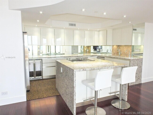 Building Photo - 20191 E Country Club Dr