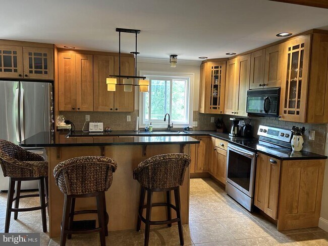 Foto del edificio - 975 Wind Song Rd