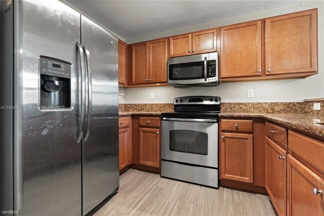 Building Photo - 3 br, 2.5 bath House - 11605 NW 89th St Ap...