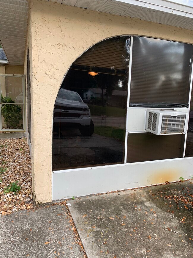 screen big porch with window AC. - 4911 23rd St W