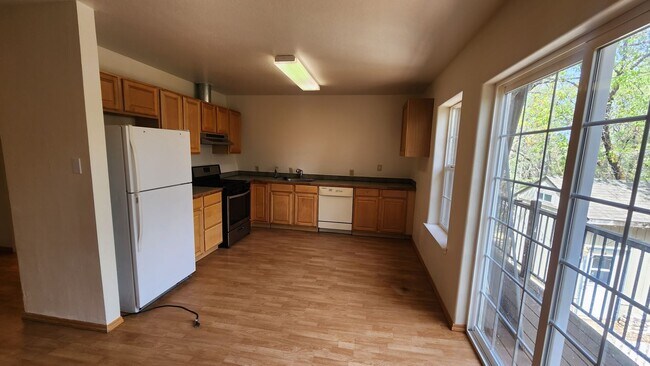 Building Photo - Spacious Upstairs Two Bedroom Unit on Acreage