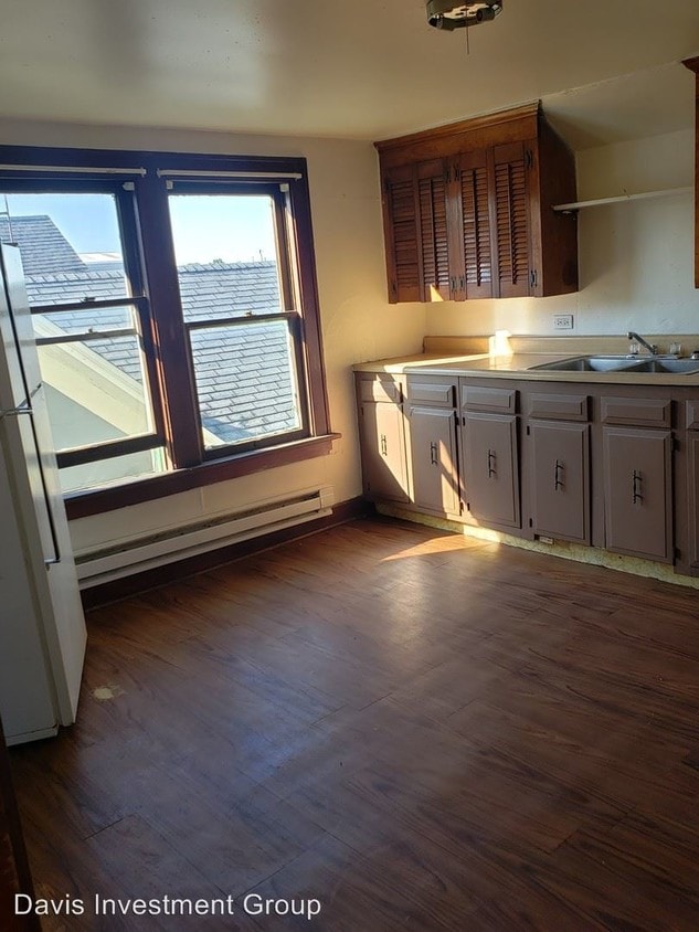 Primary Photo - 1411-1411 1/2 Milan Rd
