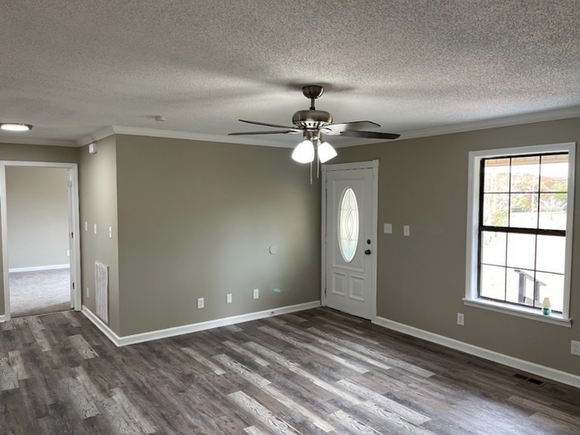 Building Photo - Spacious 4-Bedroom Home with Bonus Suite i...