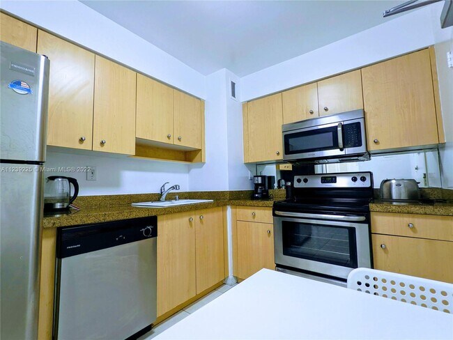 Building Photo - 9195 Collins Ave
