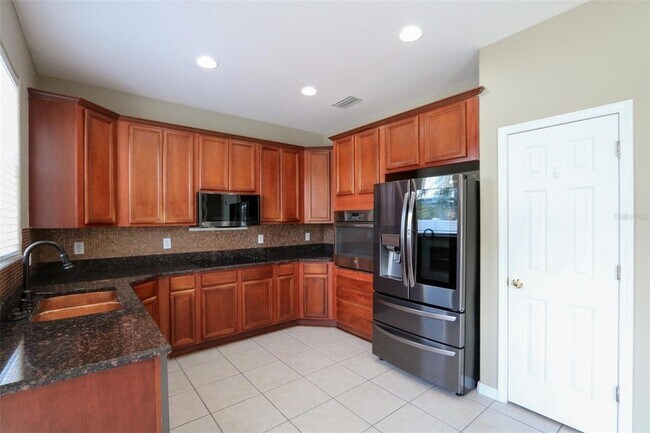 Foto del edificio - 9018 Pinebreeze Dr