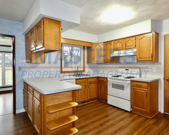 Building Photo - Move-In Special: 50% Off First Month’s Rent!