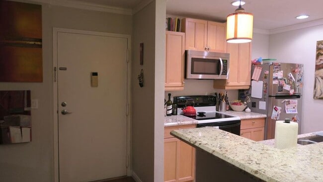 Stainless stell appliances, recessed lights, granite countertops & pendant lights - 6111 Rancho Mission Rd
