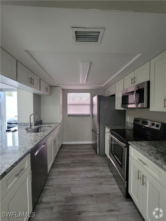 Building Photo - 4815 Triton Ct E