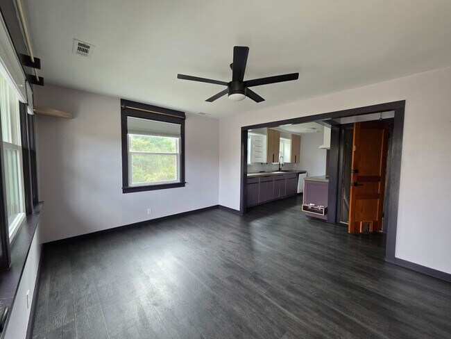 Building Photo - Charming 2BR with Walk-Out Basement, Fenced Yard & Flexible Murphy-Bed Office