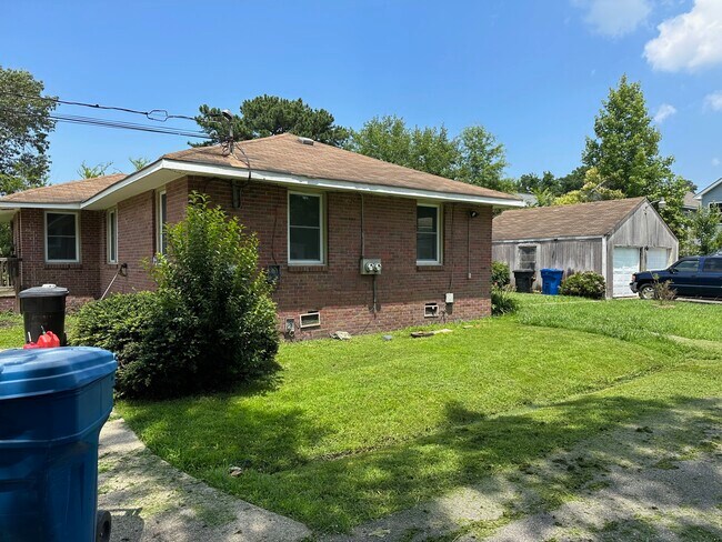 front/bush removed - 200 N Fir Ave