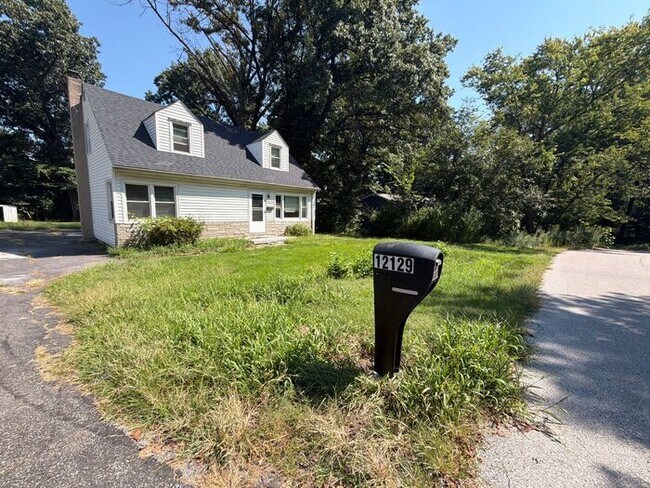 Building Photo - Spacious 4-Bedroom Home with Garage & Breezeway