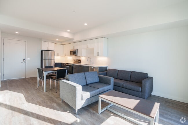 3BR, 2BA - 1360SF - Living Room - The Lair Apartments