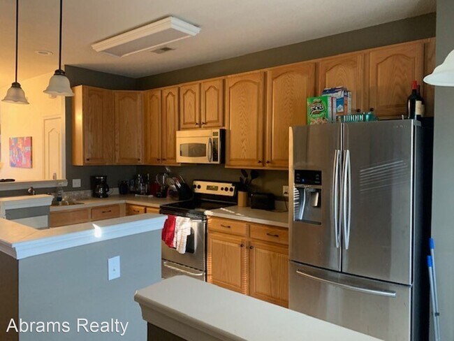 Building Photo - 3 br, 2.5 bath House - 3818 Magwood Court