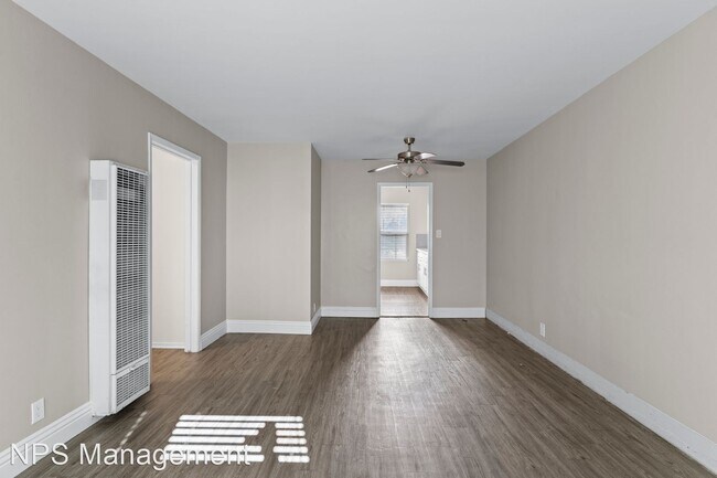 Building Photo - 1 br, 1 bath Apartment - 201-209 E 12th St...