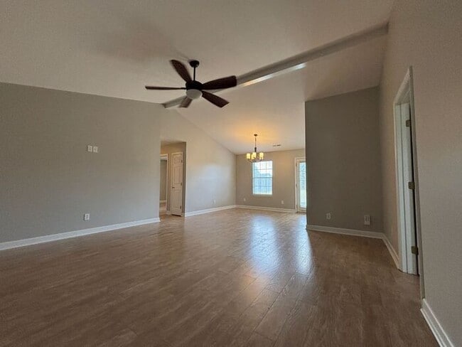 Building Photo - You will LOVE the fenced yard!