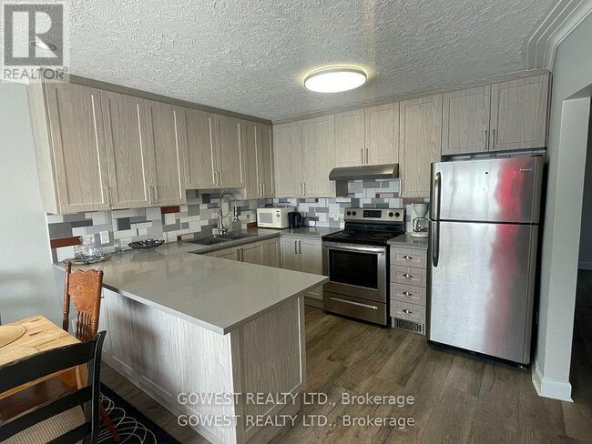 Photo du bâtiment - 158 Dixon Rd